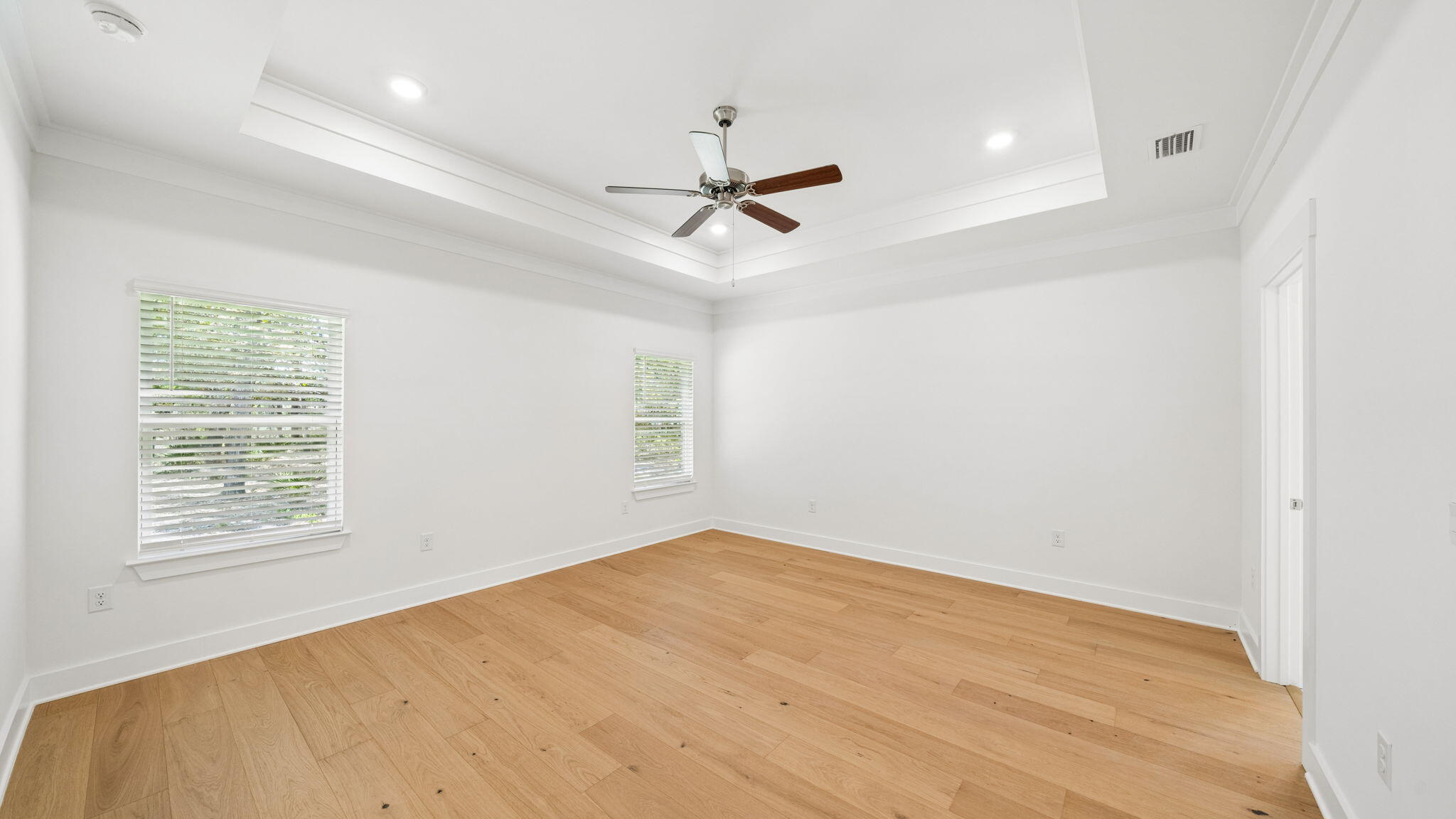 785 Old Ferry Road Santa Rosa Beach, FL 32459 - Photo 22 of 56 an empty room with windows and fan