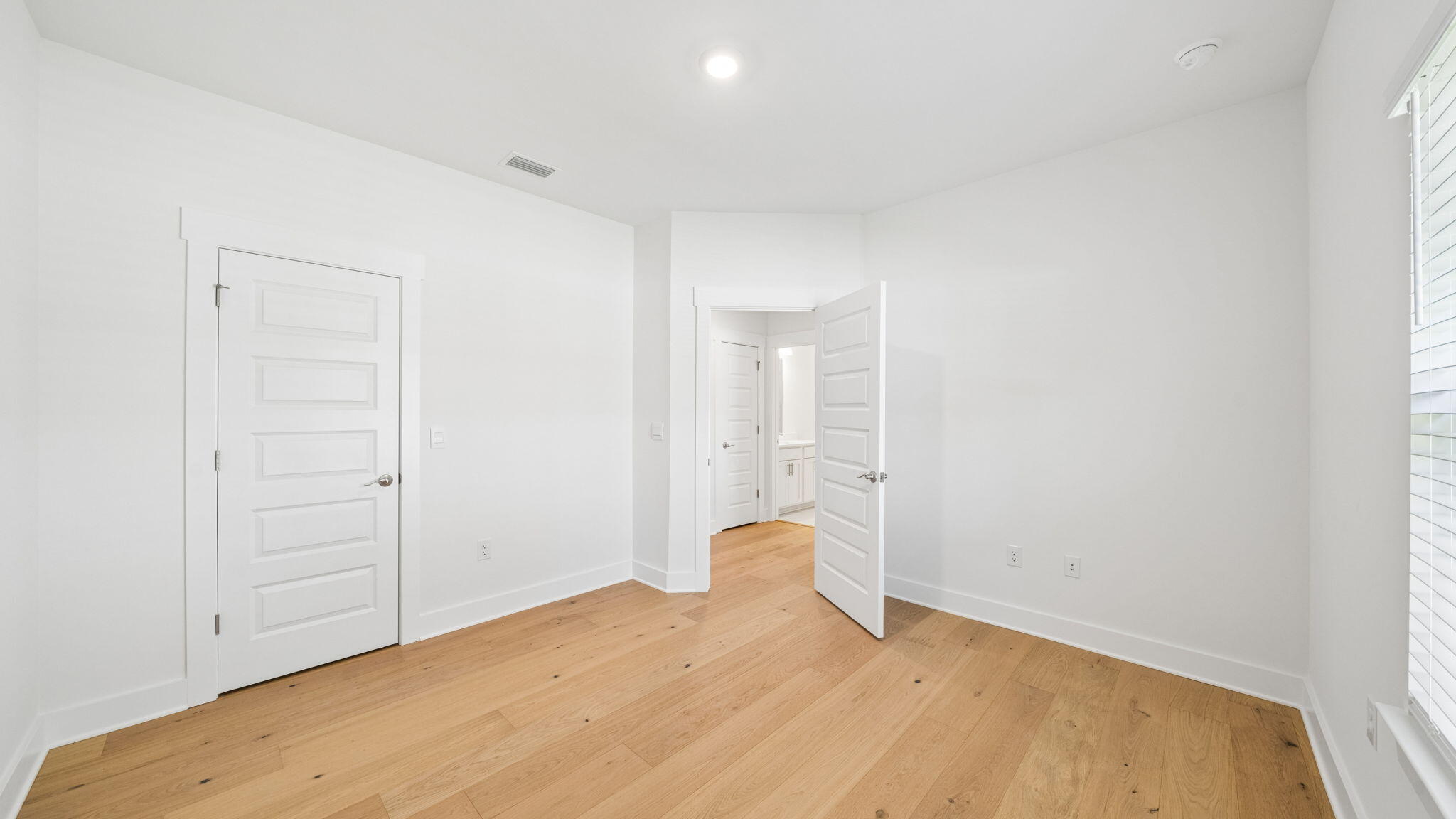 785 Old Ferry Road Santa Rosa Beach, FL 32459 - Photo 37 of 56 a view of empty room with wooden floor