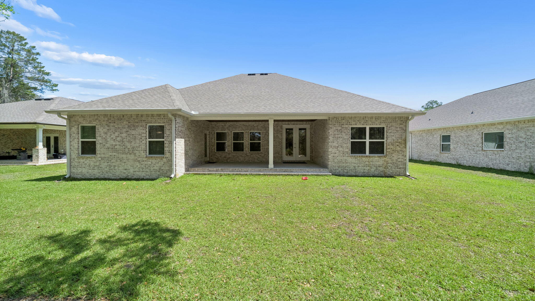 785 Old Ferry Road Santa Rosa Beach, FL 32459 - Photo 42 of 56 a house view with a garden space
