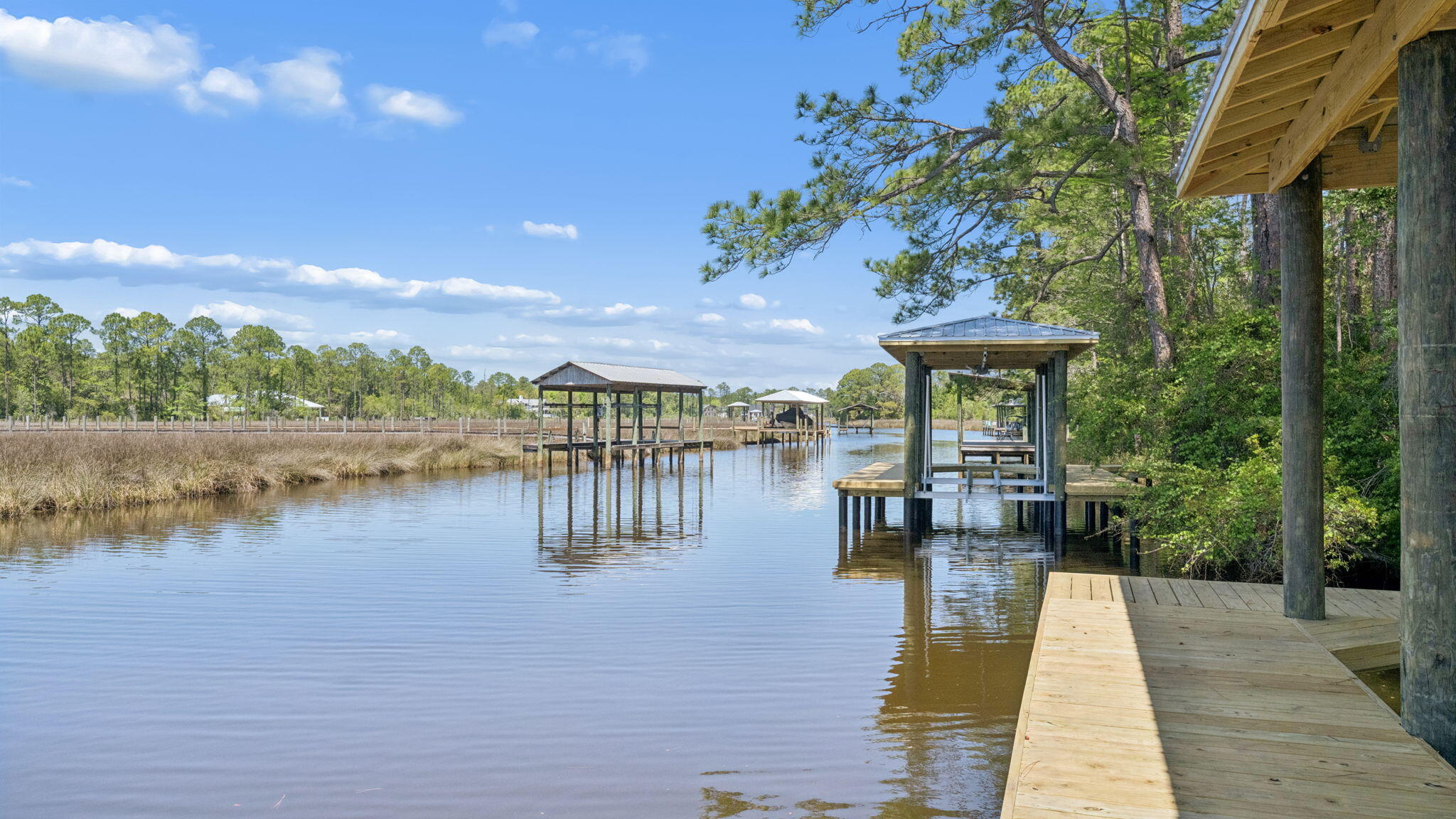 785 Old Ferry Road Santa Rosa Beach, FL 32459 - Photo 43 of 56 a view of a lake with sitting area