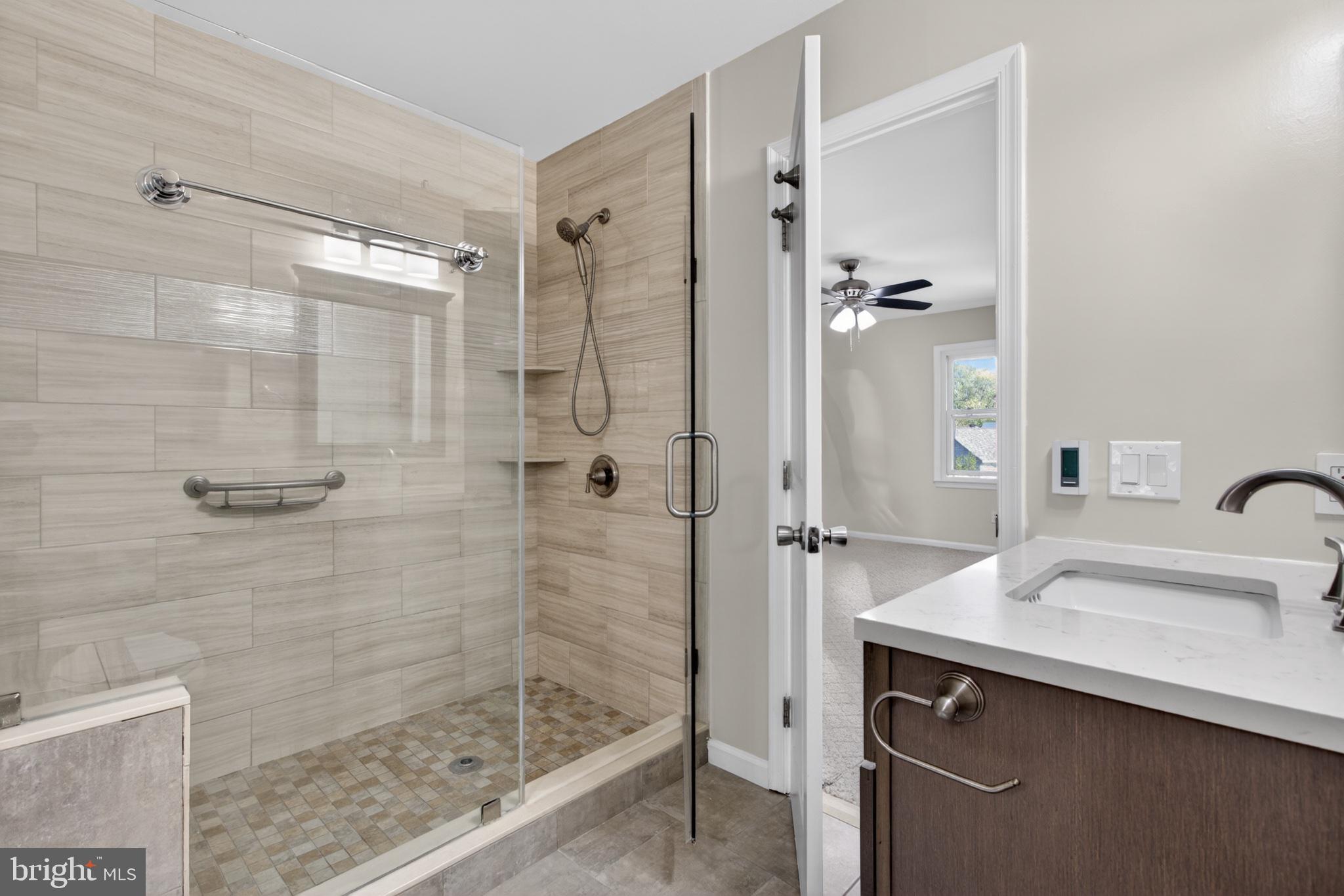 16 Redding Ridge Drive Gaithersburg, MD 20878 - Photo 27 of 53 Modern bathroom with sleek design.