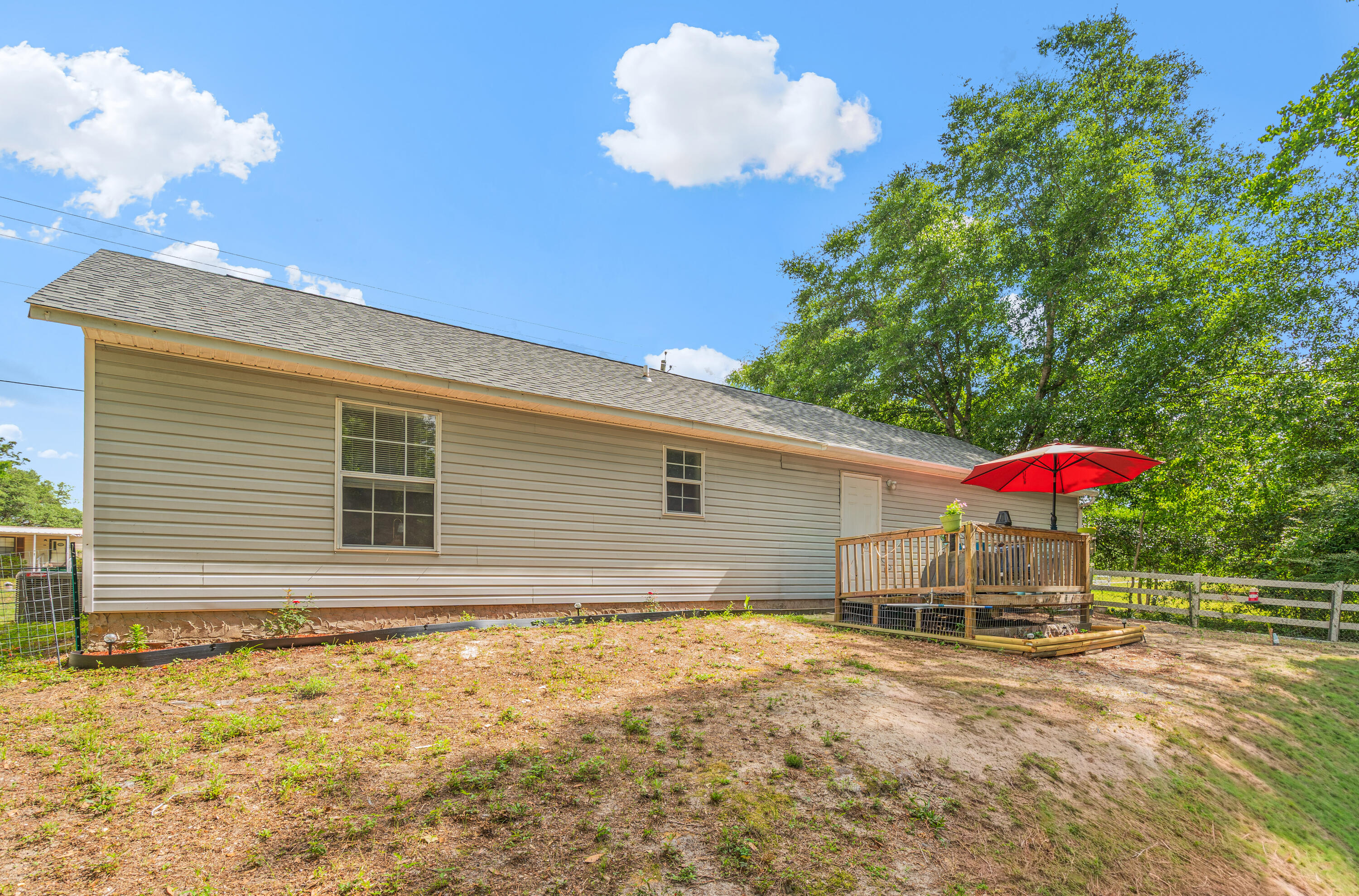 2880 Aplin Road Crestview, FL 32539 - Photo 31 of 33 a house view with a backyard space