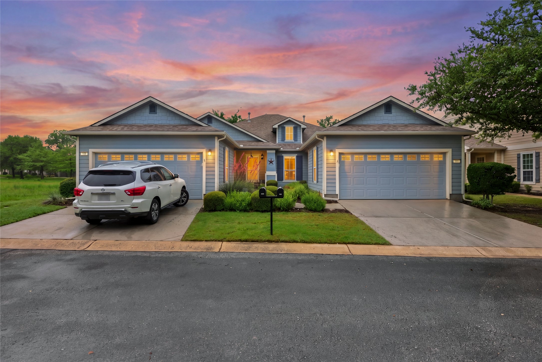 a house view with a garden space