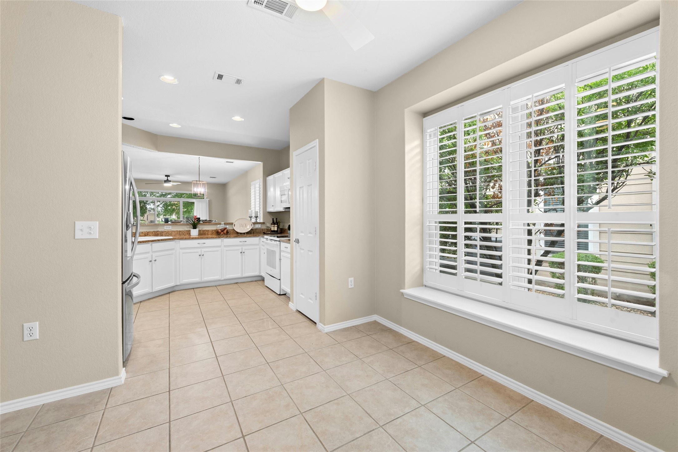 111 Hampton Circle Georgetown, TX 78633 - Photo 16 of 34 a view of a kitchen with a sink and a window