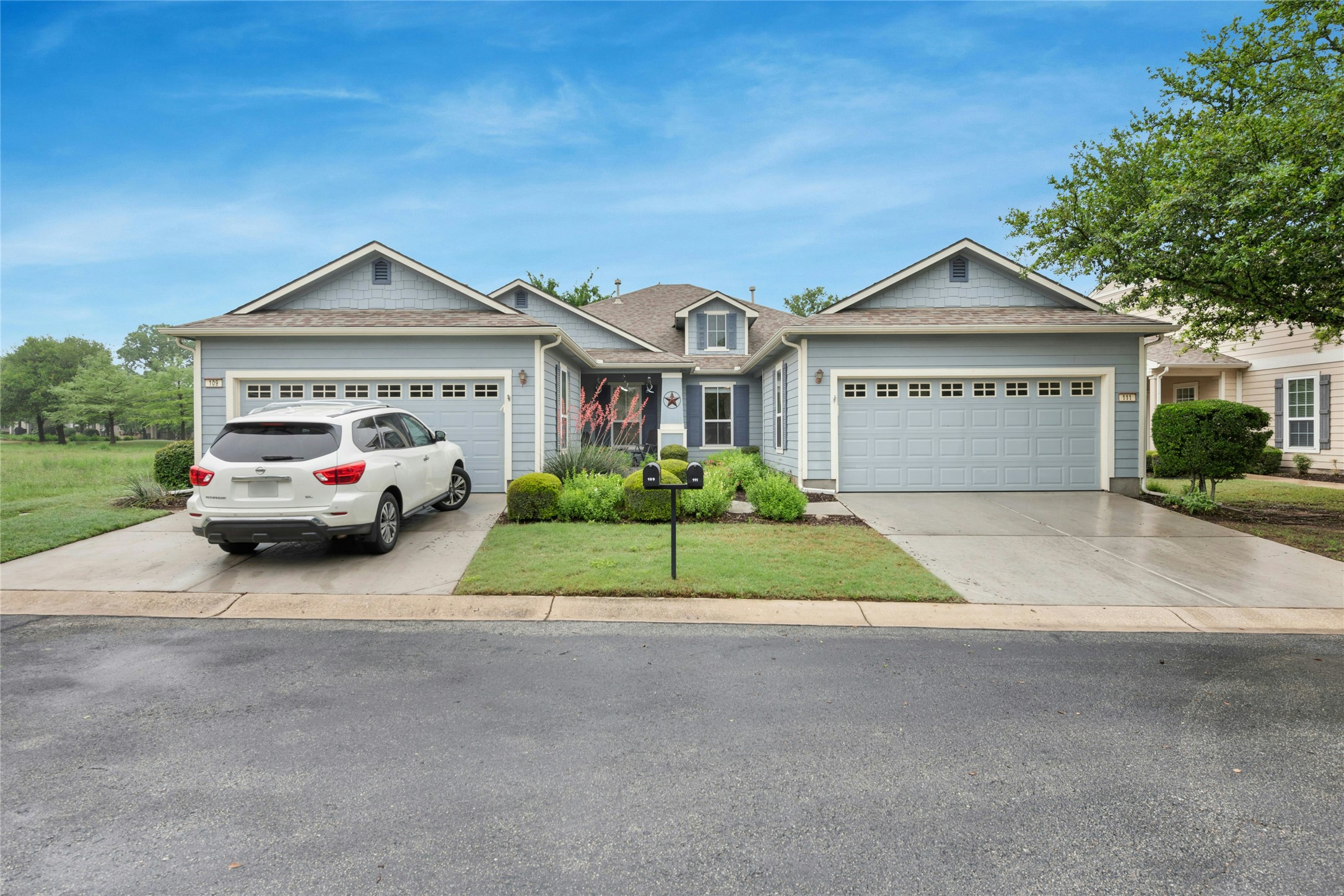 111 Hampton Circle Georgetown, TX 78633 - Photo 2 of 34 a house view with a garden space