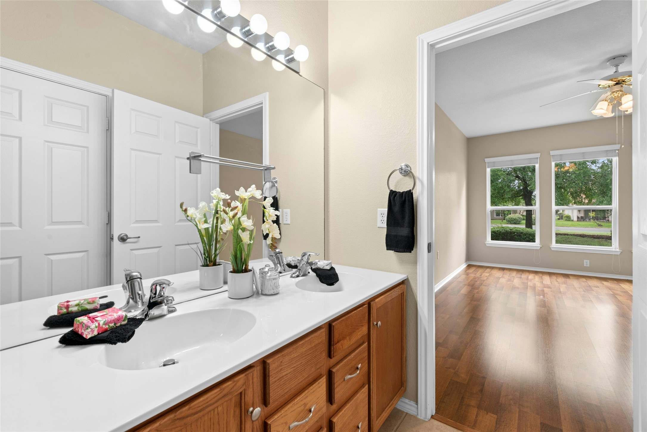 111 Hampton Circle Georgetown, TX 78633 - Photo 22 of 34 a bathroom with a sink double vanity and a mirror