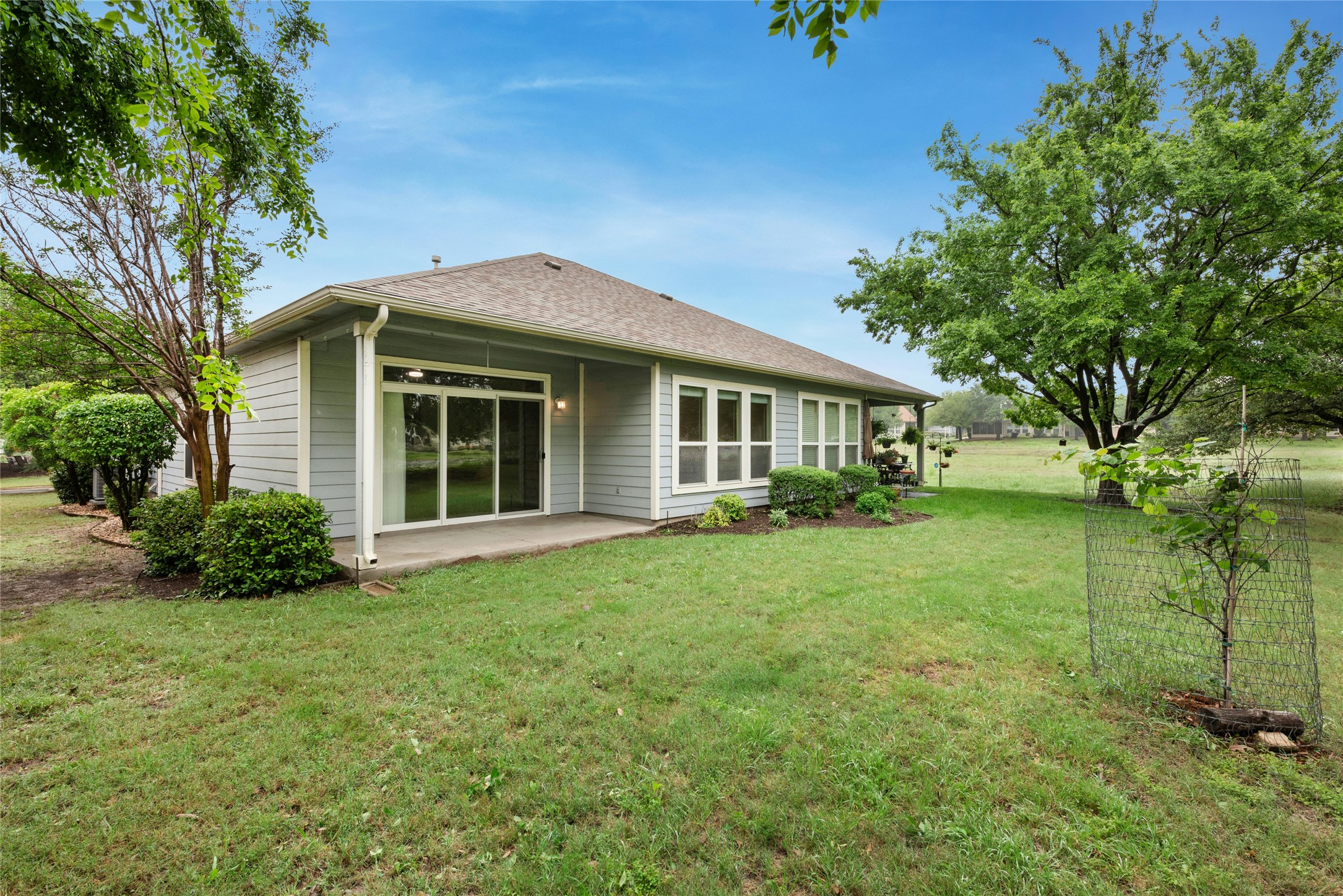 111 Hampton Circle Georgetown, TX 78633 - Photo 27 of 34 a front view of a house with a garden