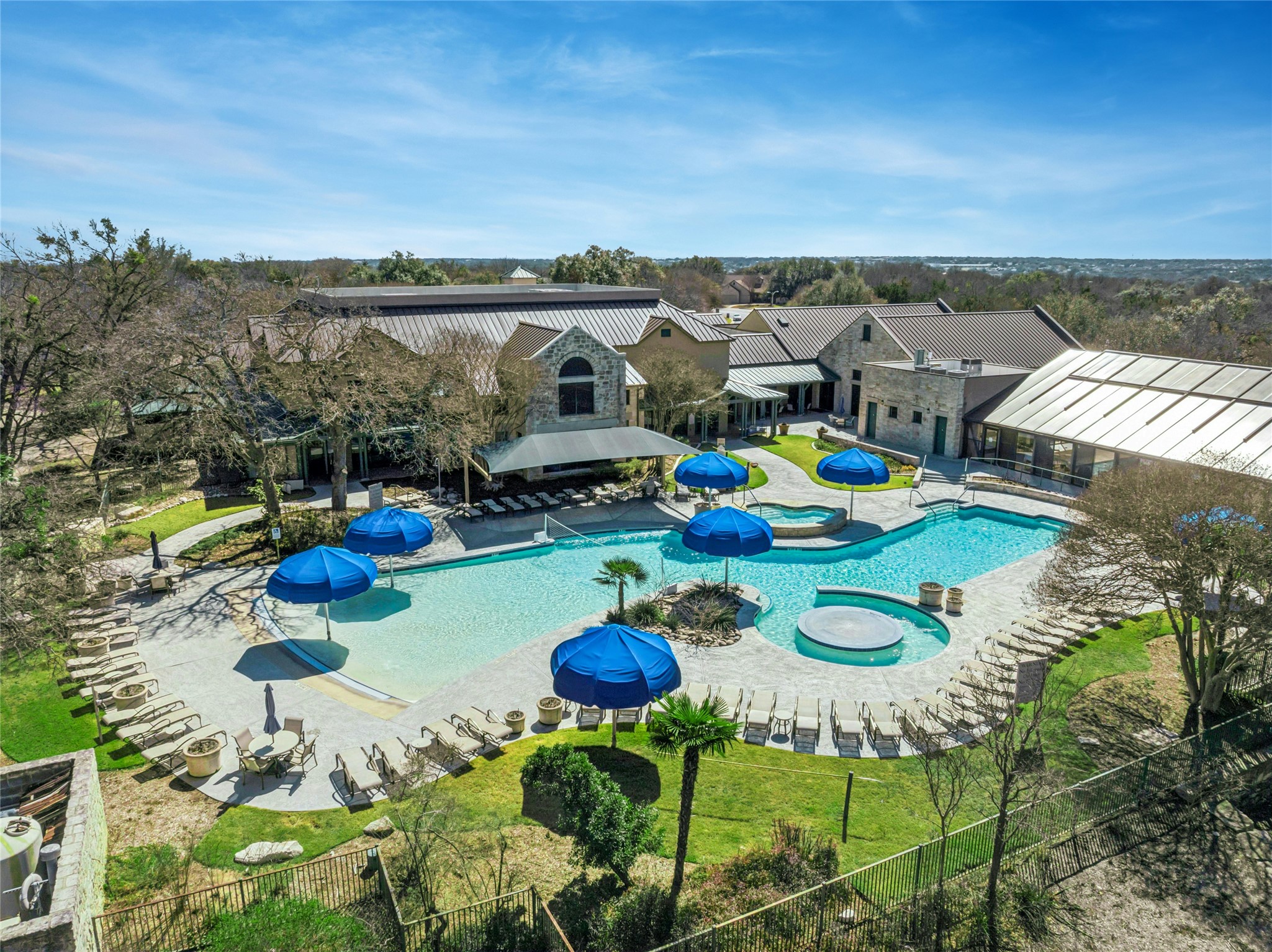 111 Hampton Circle Georgetown, TX 78633 - Photo 31 of 34 a view of a swimming pool and lounge chairs