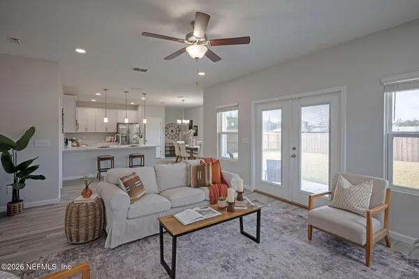 a view of a livingroom with wooden floor