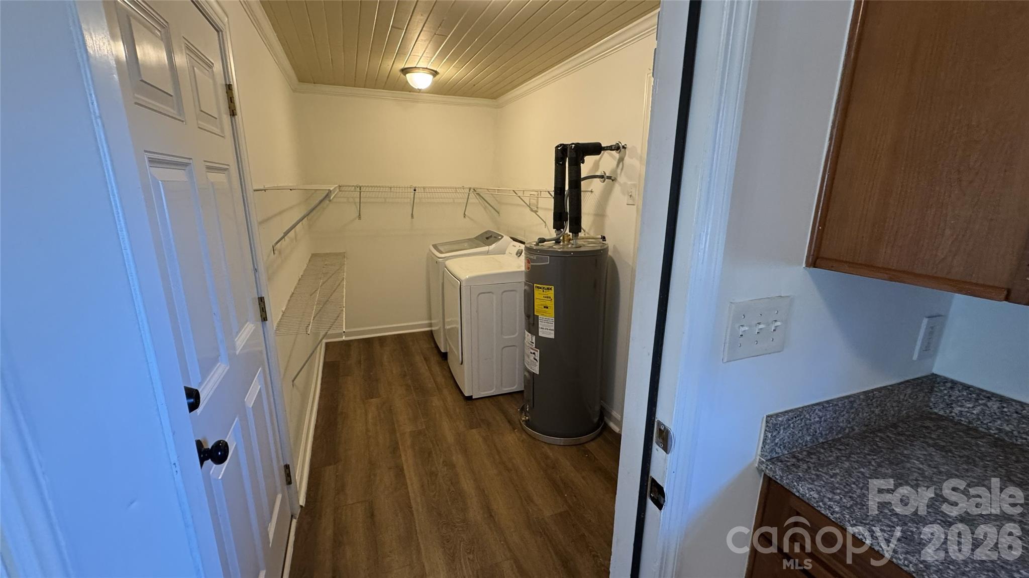 7507 Wilson Grove Road Mint Hill, NC 28227 - Photo 18 of 48 a utility room with dryer and washer