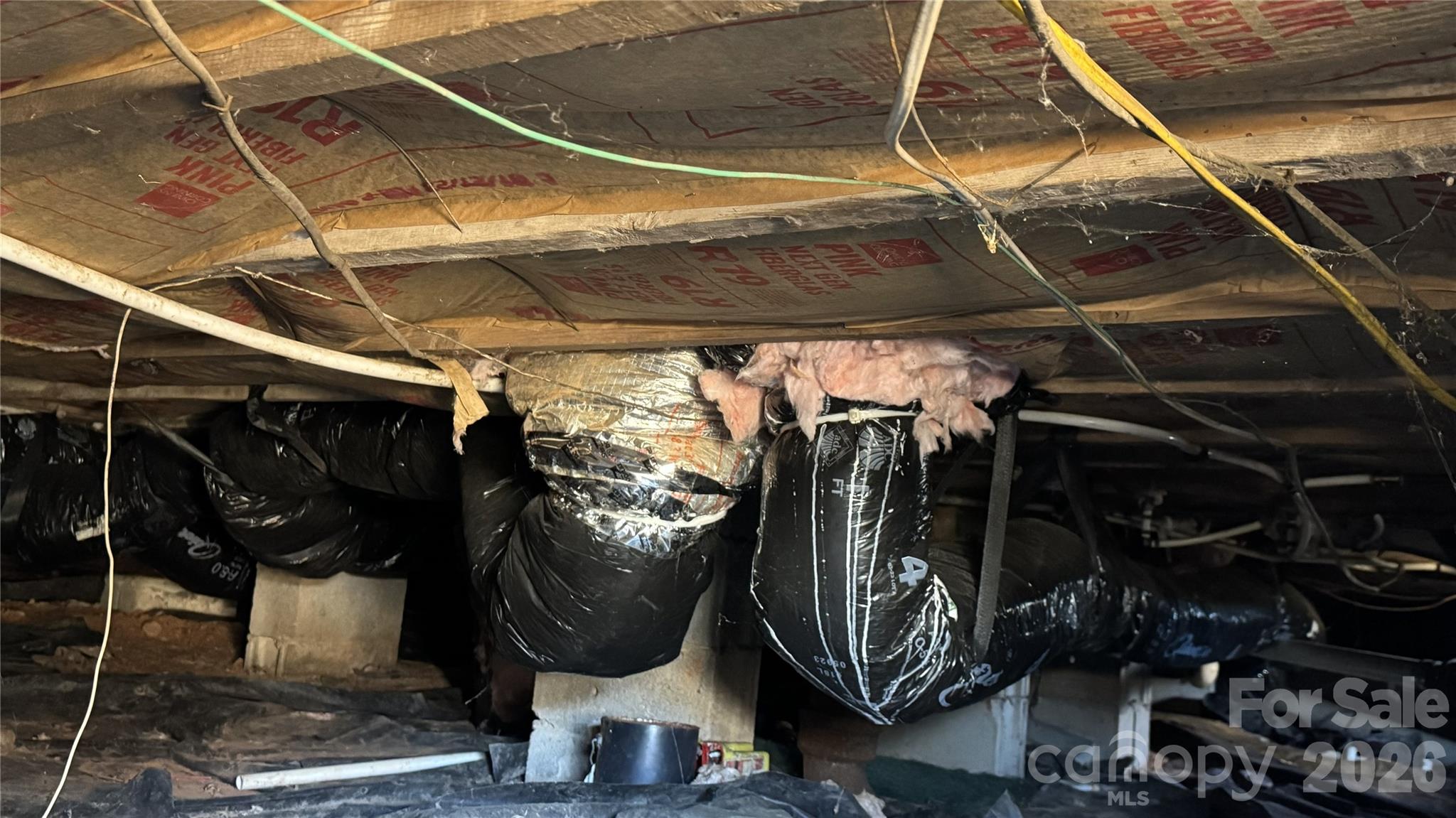 7507 Wilson Grove Road Mint Hill, NC 28227 - Photo 28 of 48 a view of walk in closet with clothes and shoes