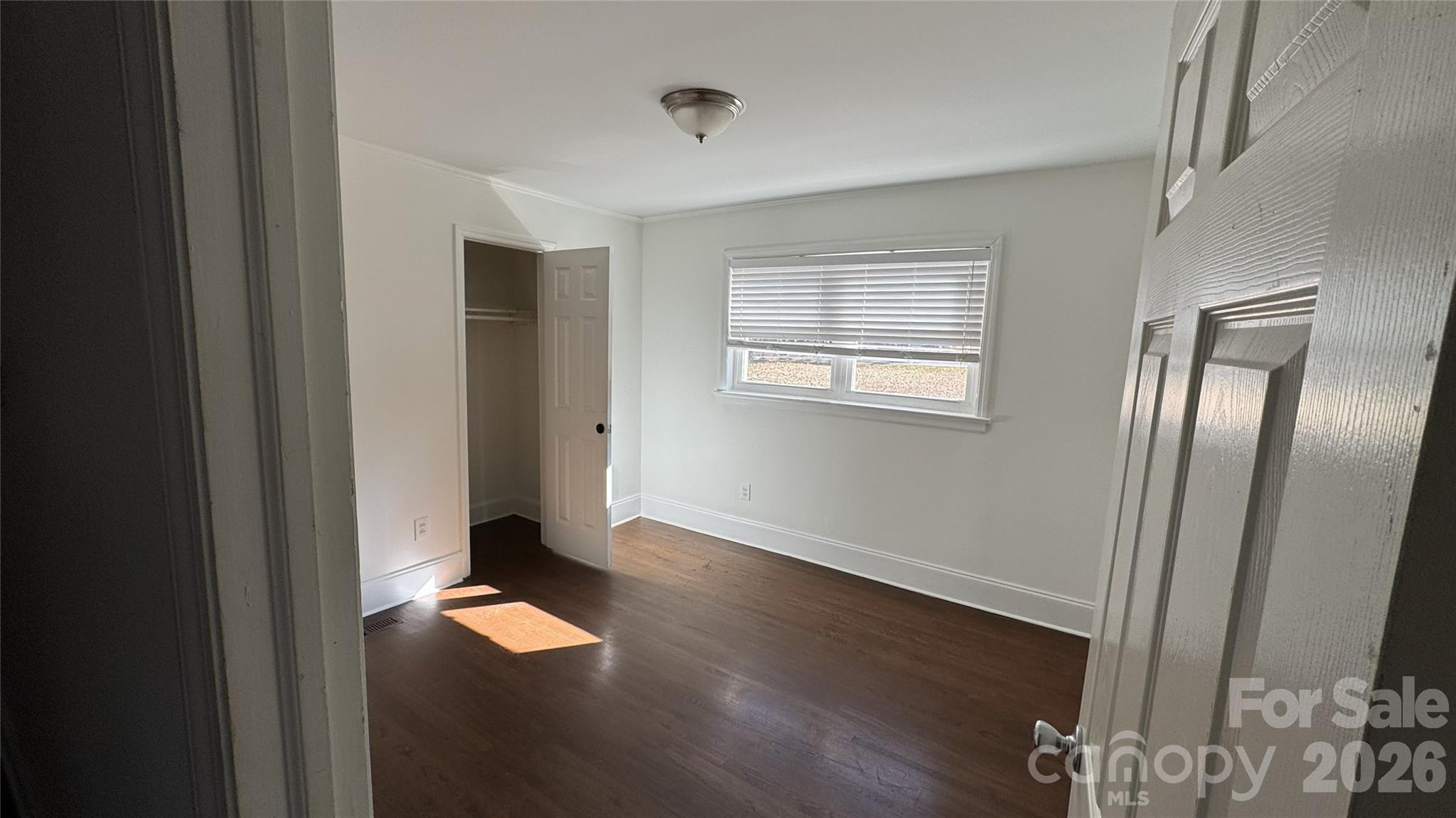 7507 Wilson Grove Road Mint Hill, NC 28227 - Photo 32 of 48 a view of empty room with wooden floor
