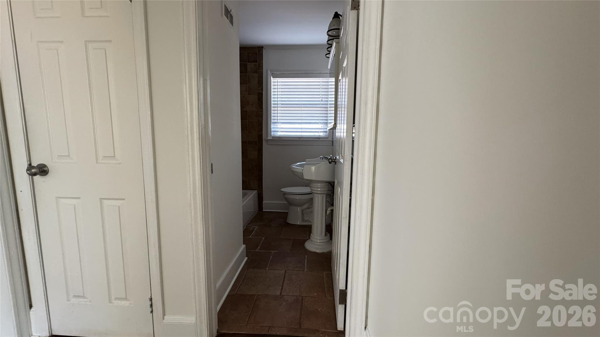 7507 Wilson Grove Road Mint Hill, NC 28227 - Photo 33 of 48 a bathroom with a toilet