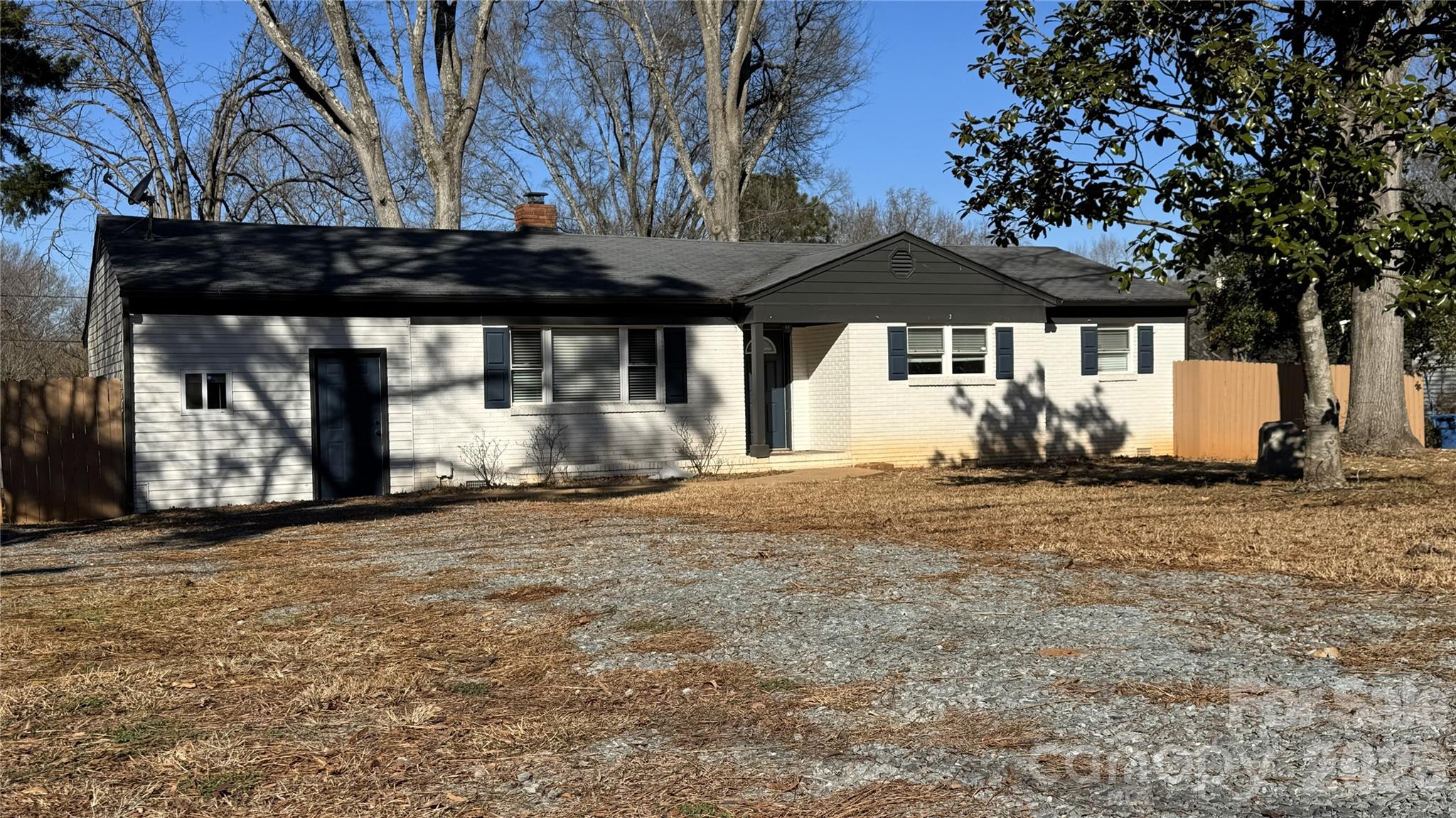 7507 Wilson Grove Road Mint Hill, NC 28227 - Photo 4 of 48 a view of a car park front of a house