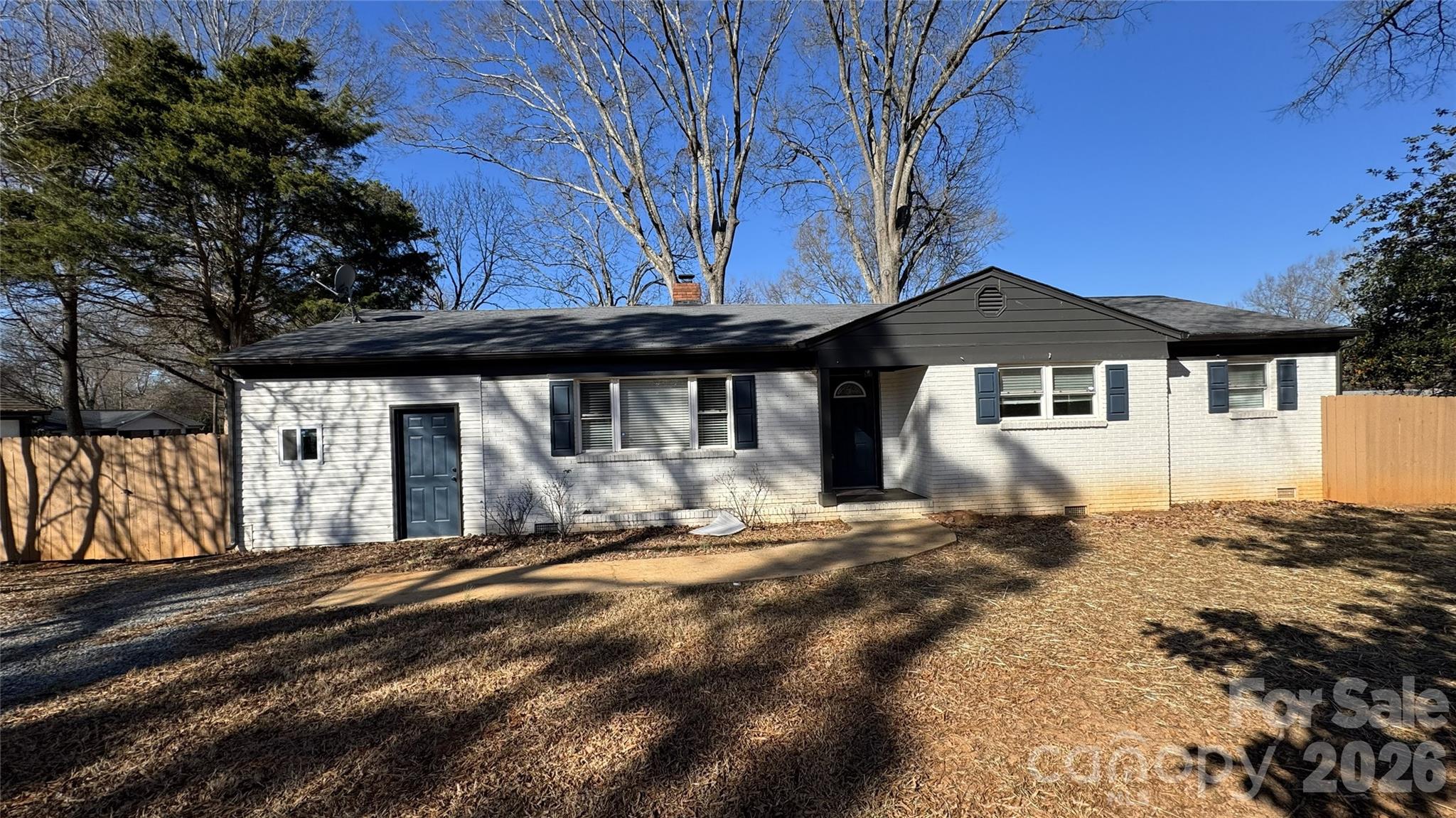 7507 Wilson Grove Road Mint Hill, NC 28227 - Photo 48 of 48 a front view of a house with a yard