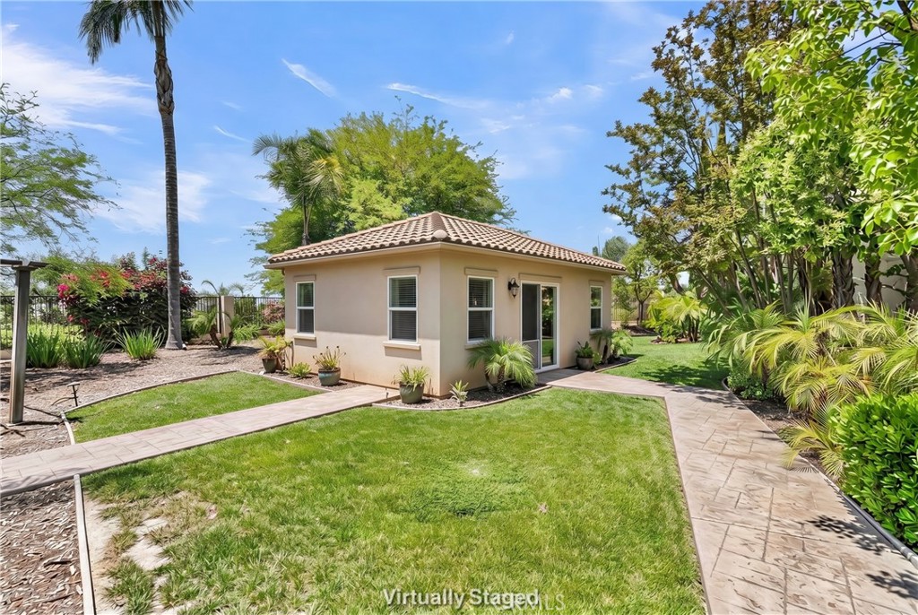 7780 Solitude Court Riverside, CA 92506 - Photo 55 of 71 a view of a house with a yard