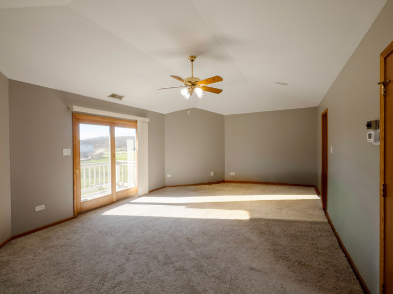 13310 Derby Road Lemont, IL 60439 - Photo 20 of 48 a view of an empty room with a window