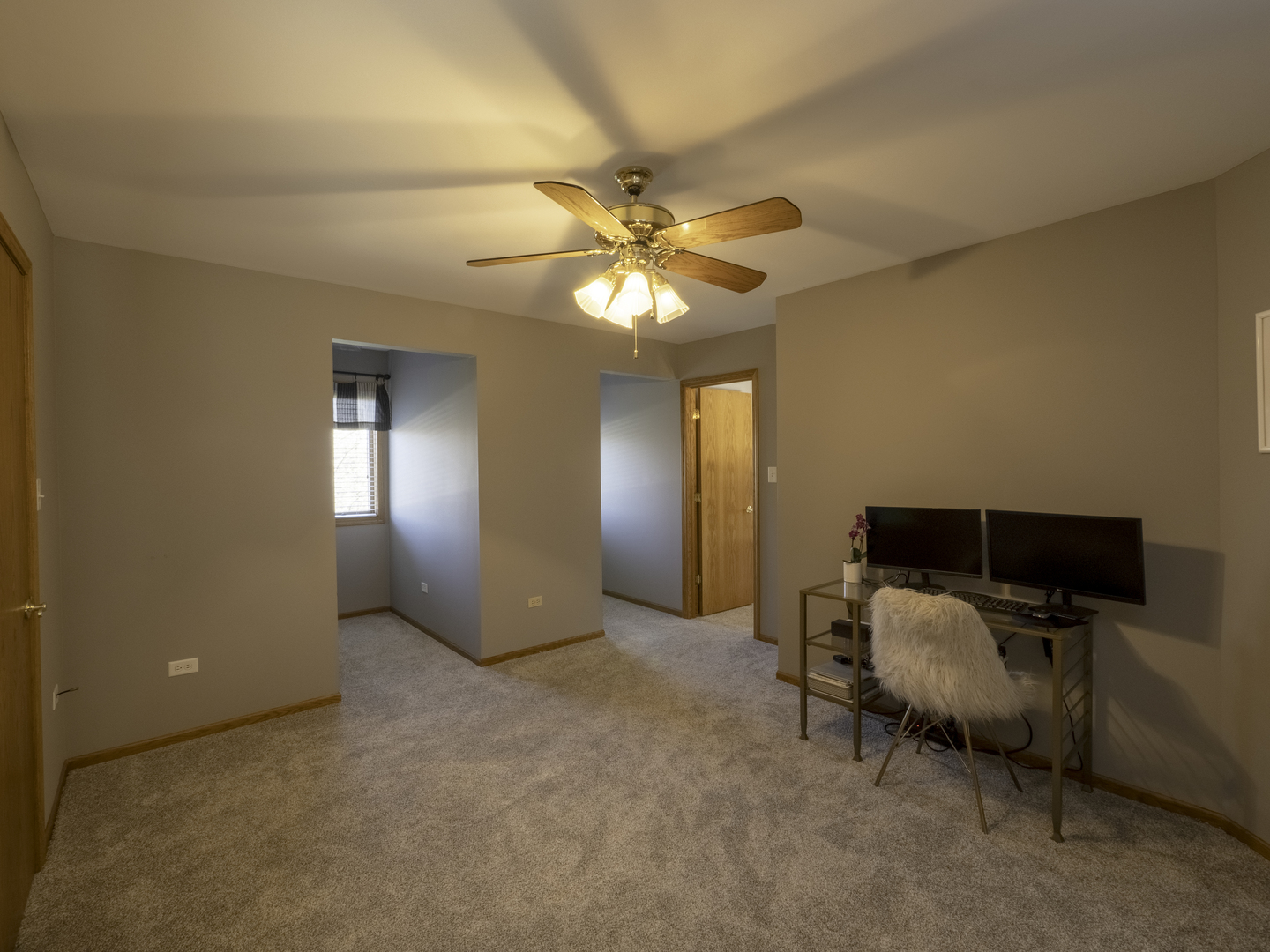 13310 Derby Road Lemont, IL 60439 - Photo 27 of 48 a workspace with furniture and chandelier fan