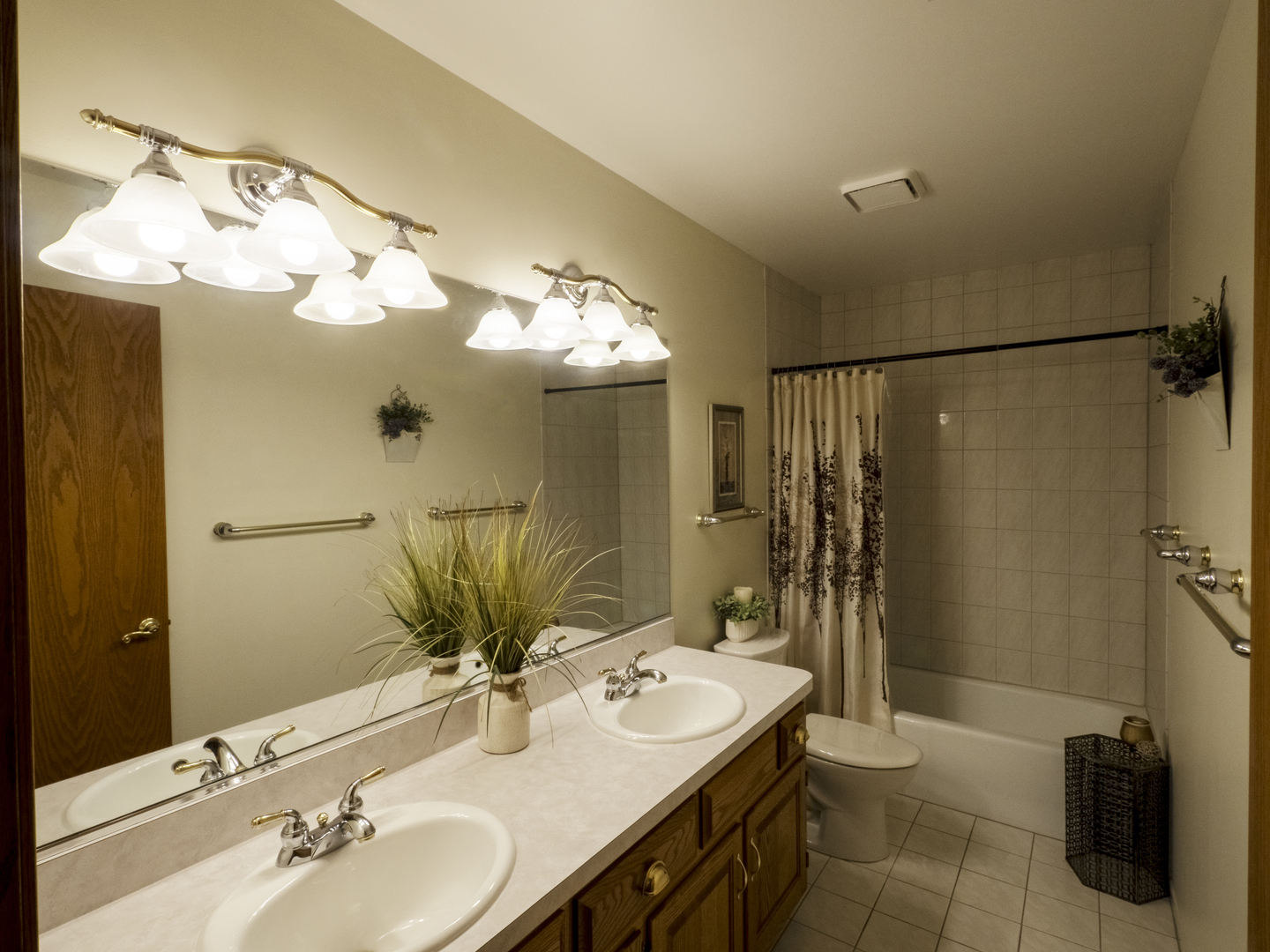 13310 Derby Road Lemont, IL 60439 - Photo 28 of 48 a bathroom with a double vanity sink mirror and shower