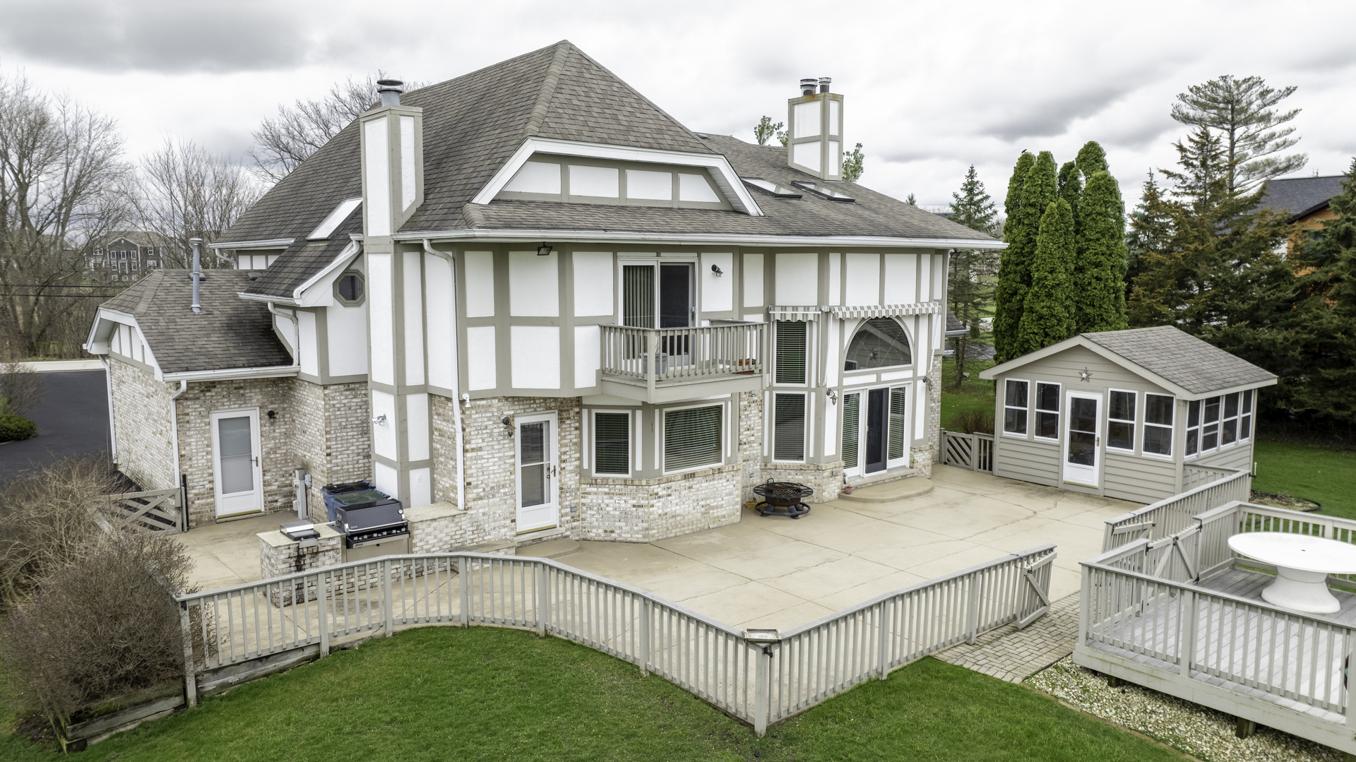 13310 Derby Road Lemont, IL 60439 - Photo 3 of 48 a view of white house with a yard table and chairs