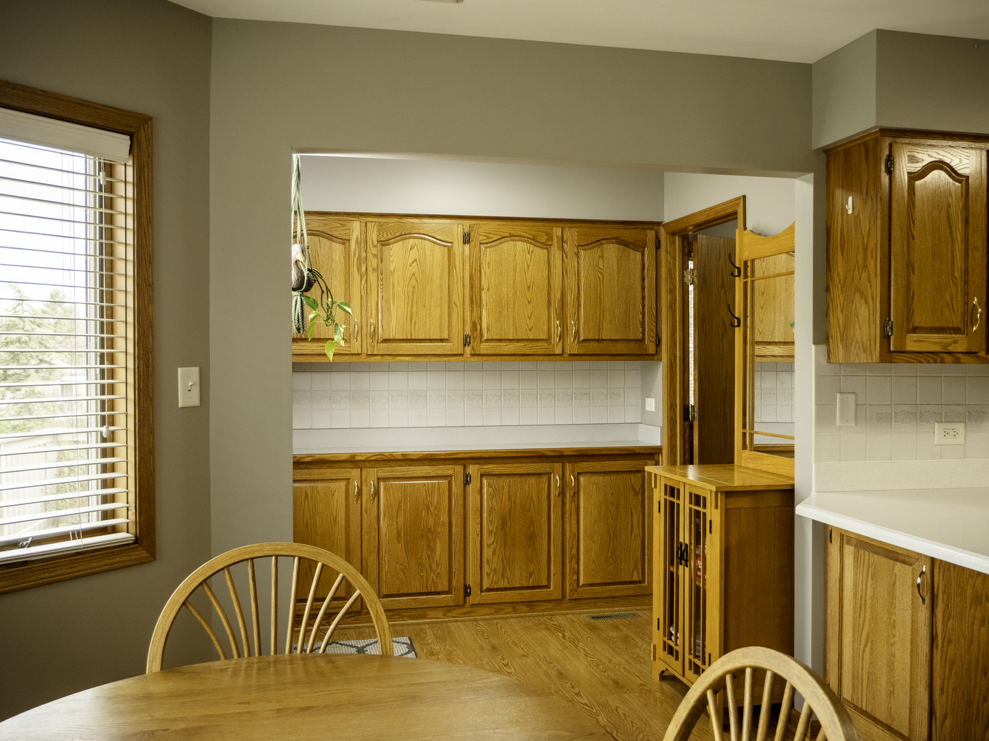 13310 Derby Road Lemont, IL 60439 - Photo 10 of 48 a view of a balcony with furniture and a window