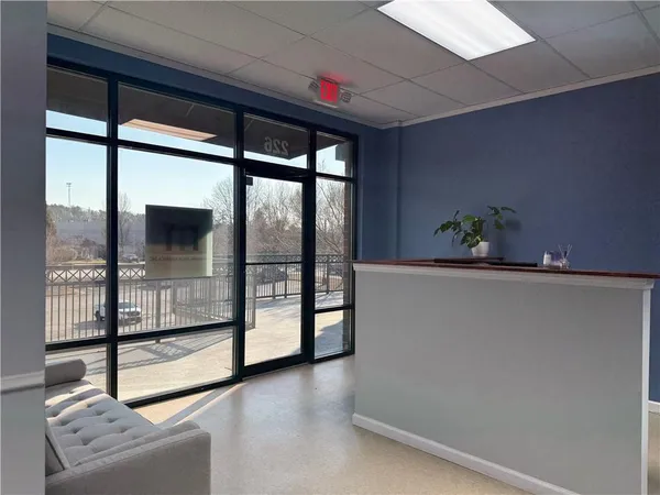 wooden floor in an empty room with glass door