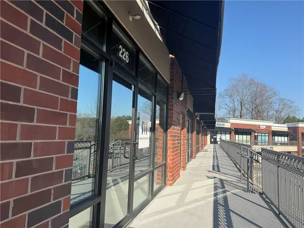 a view of a balcony with staircase