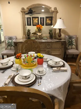 a view of a dining room with furniture