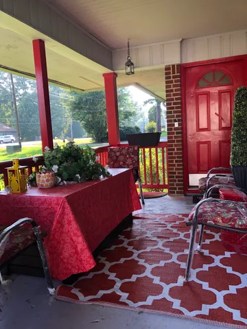 a view of a dining room with furniture