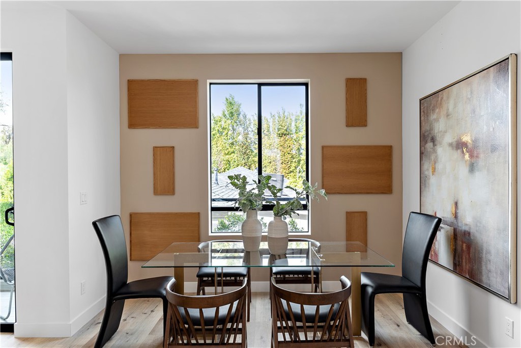 11857 West Flower Ln Valley Village Valley Village, CA 91607 - Photo 16 of 54 a view of a dining room with furniture window and outside view