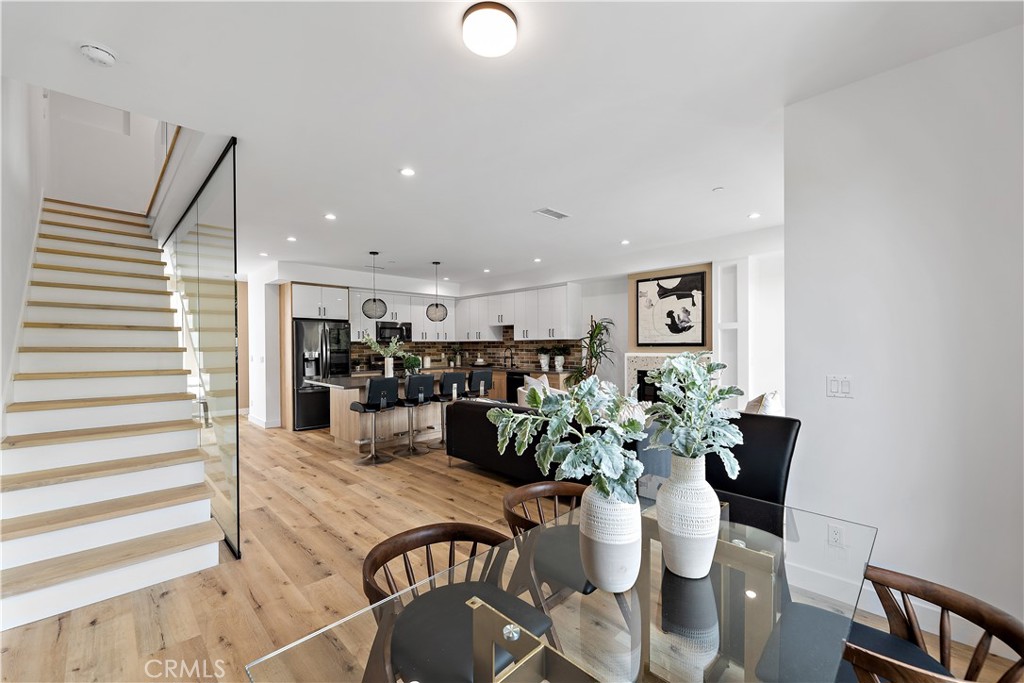 11857 West Flower Ln Valley Village Valley Village, CA 91607 - Photo 18 of 54 a view of a dining room with furniture