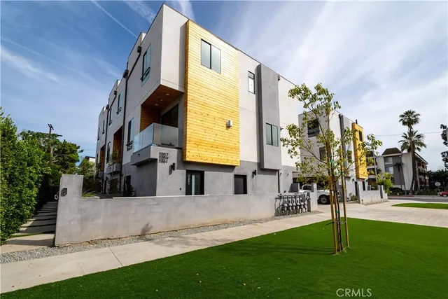 a view of a hallway with stairs