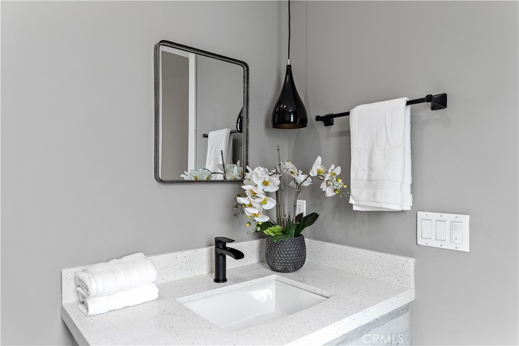 11857 West Flower Ln Valley Village Valley Village, CA 91607 - Photo 21 of 54 a close view of sink and mirror