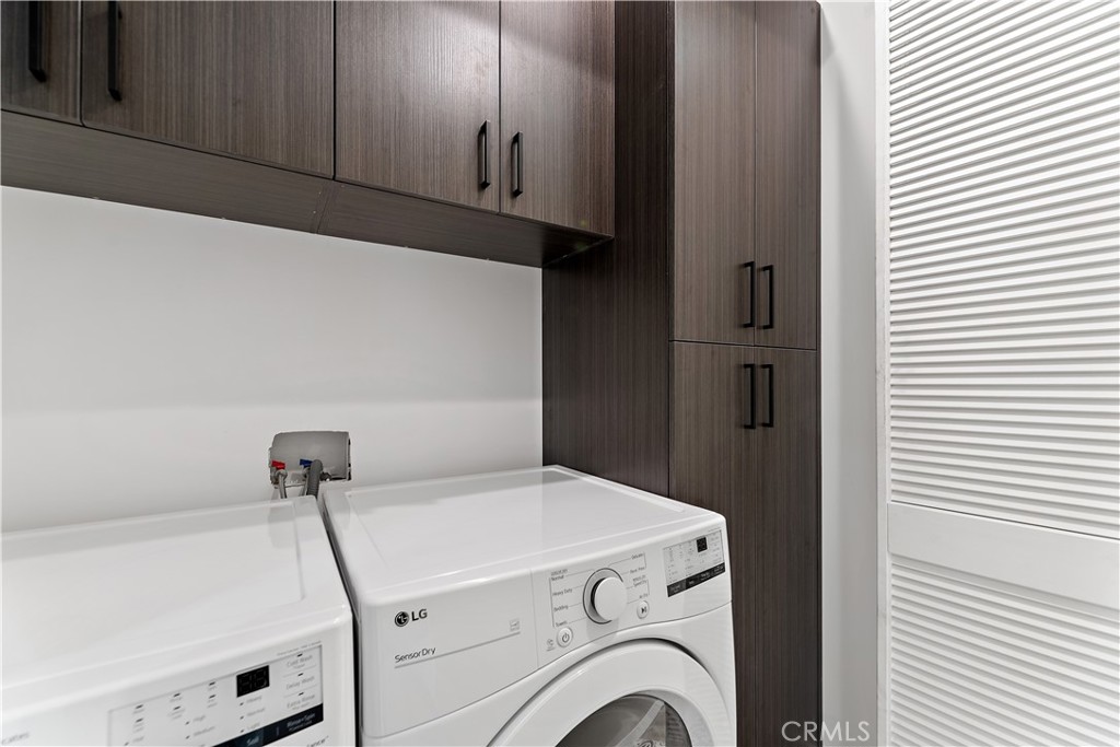 11857 West Flower Ln Valley Village Valley Village, CA 91607 - Photo 22 of 54 a utility room with dryer and washer