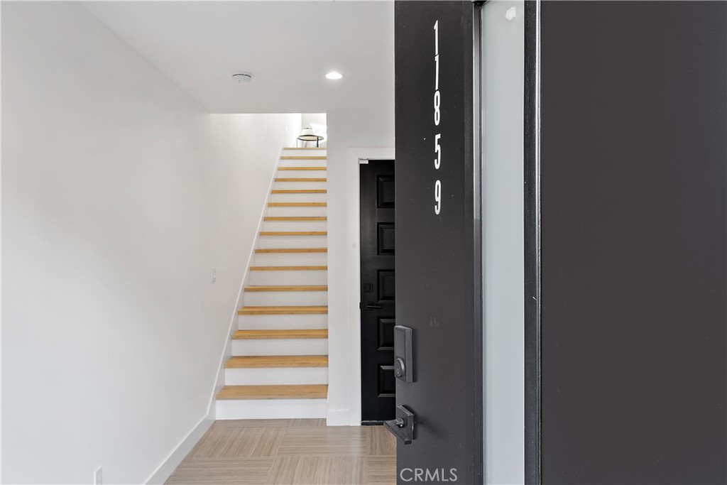 11857 West Flower Ln Valley Village Valley Village, CA 91607 - Photo 3 of 54 a view of a hallway with stairs