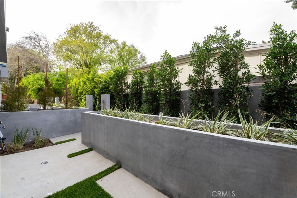 11857 West Flower Ln Valley Village Valley Village, CA 91607 - Photo 54 of 54 a view of a yard with potted plants and trees