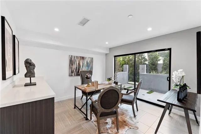 a large kitchen with kitchen island a large island in the center