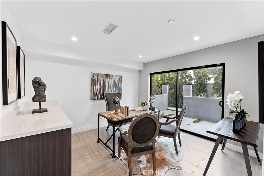 11857 West Flower Ln Valley Village Valley Village, CA 91607 - Photo 6 of 54 a work room with furniture and wooden floor
