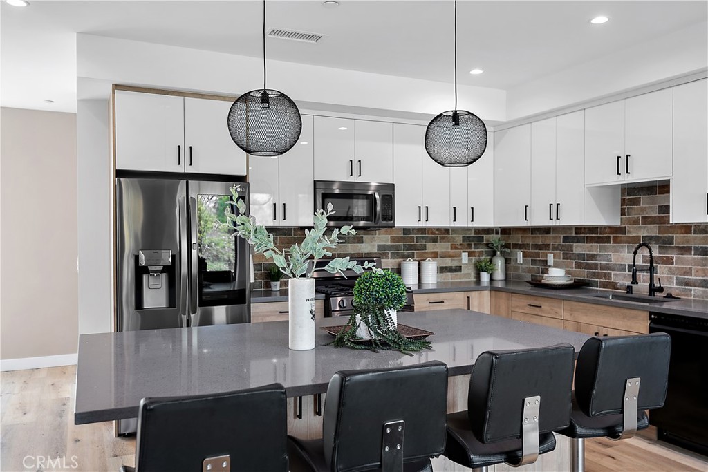 11857 West Flower Ln Valley Village Valley Village, CA 91607 - Photo 9 of 54 a room with furniture a chandelier and a window