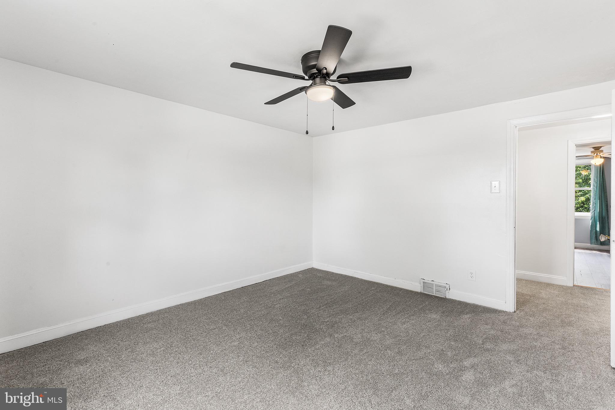 390 Glen Cove Road Collingdale, PA 19023 - Photo 15 of 27 a view of a small space with a ceiling fan