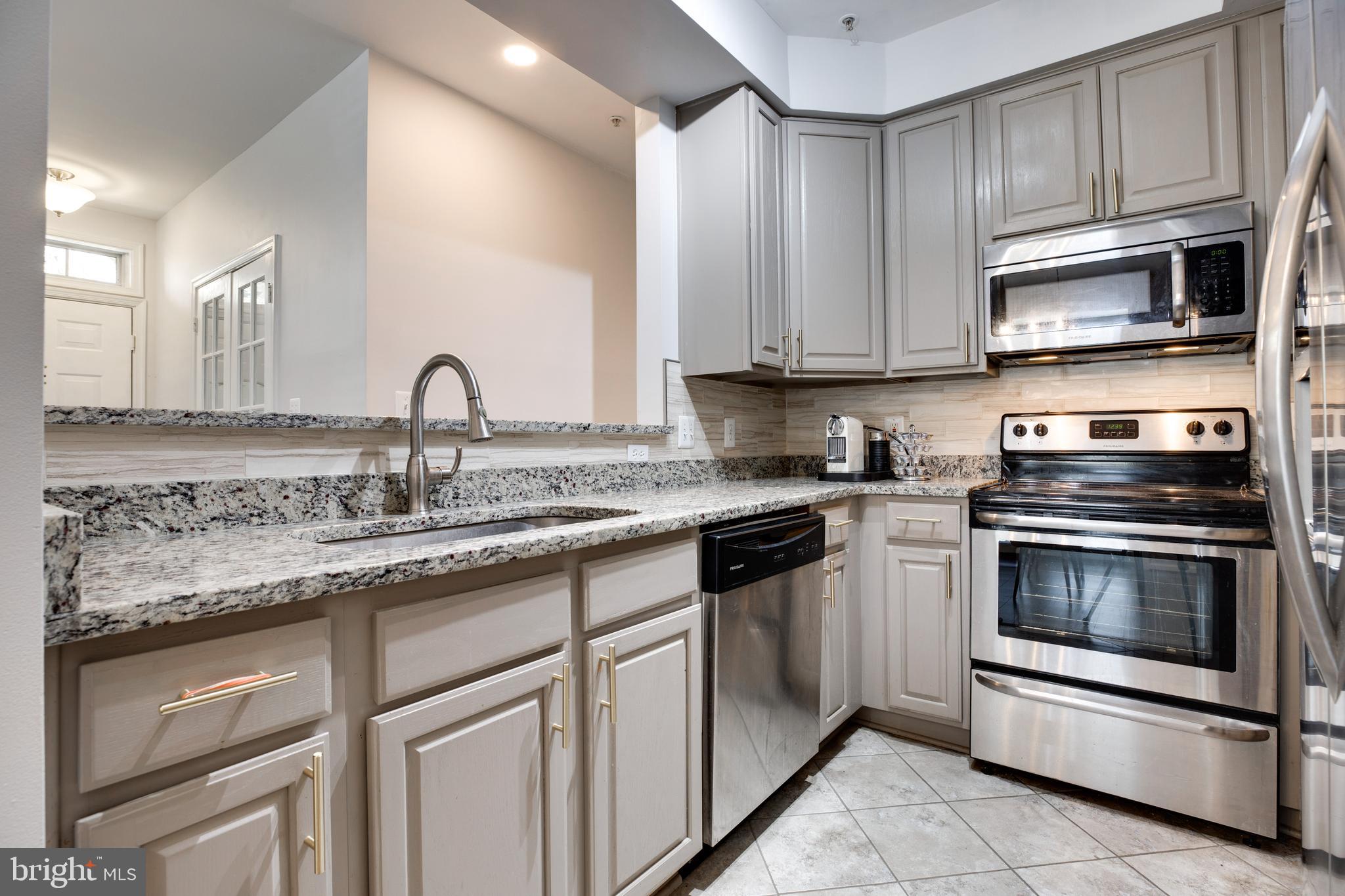 11318 Sundial Court, Unit 813 Reston, VA 20194 - Photo 12 of 26 Granite counter top