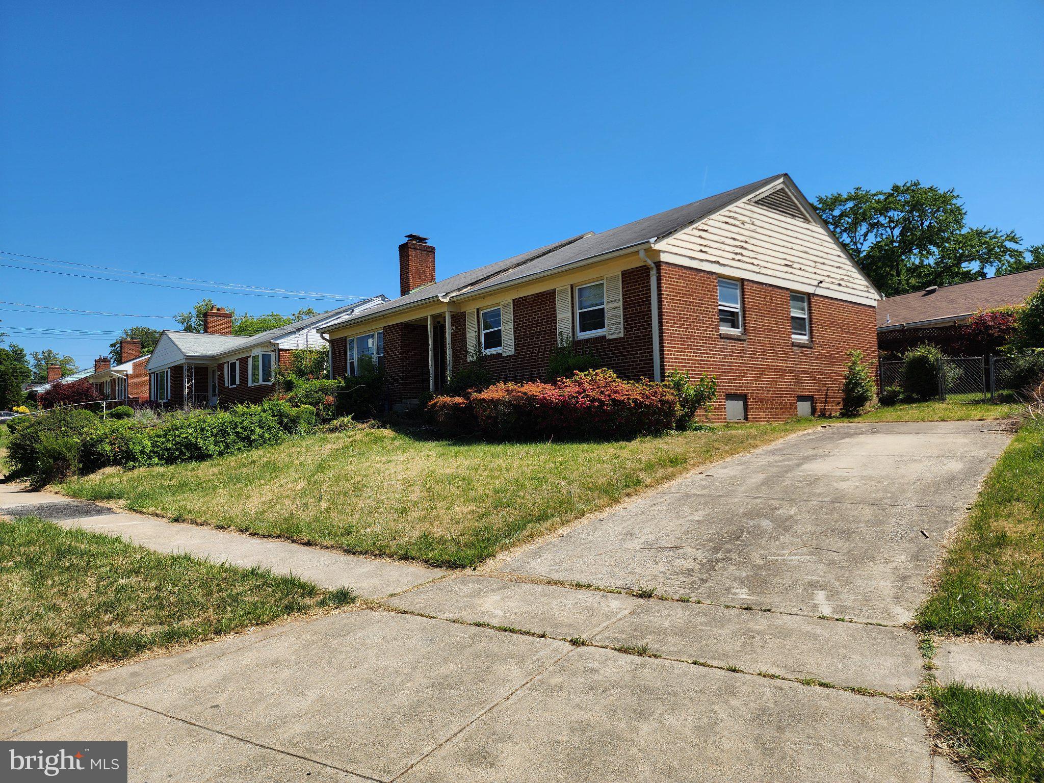 9709 Admiralty Drive Silver Spring, MD 20910 - Photo 2 of 39 Charming brick home with lush greenery.