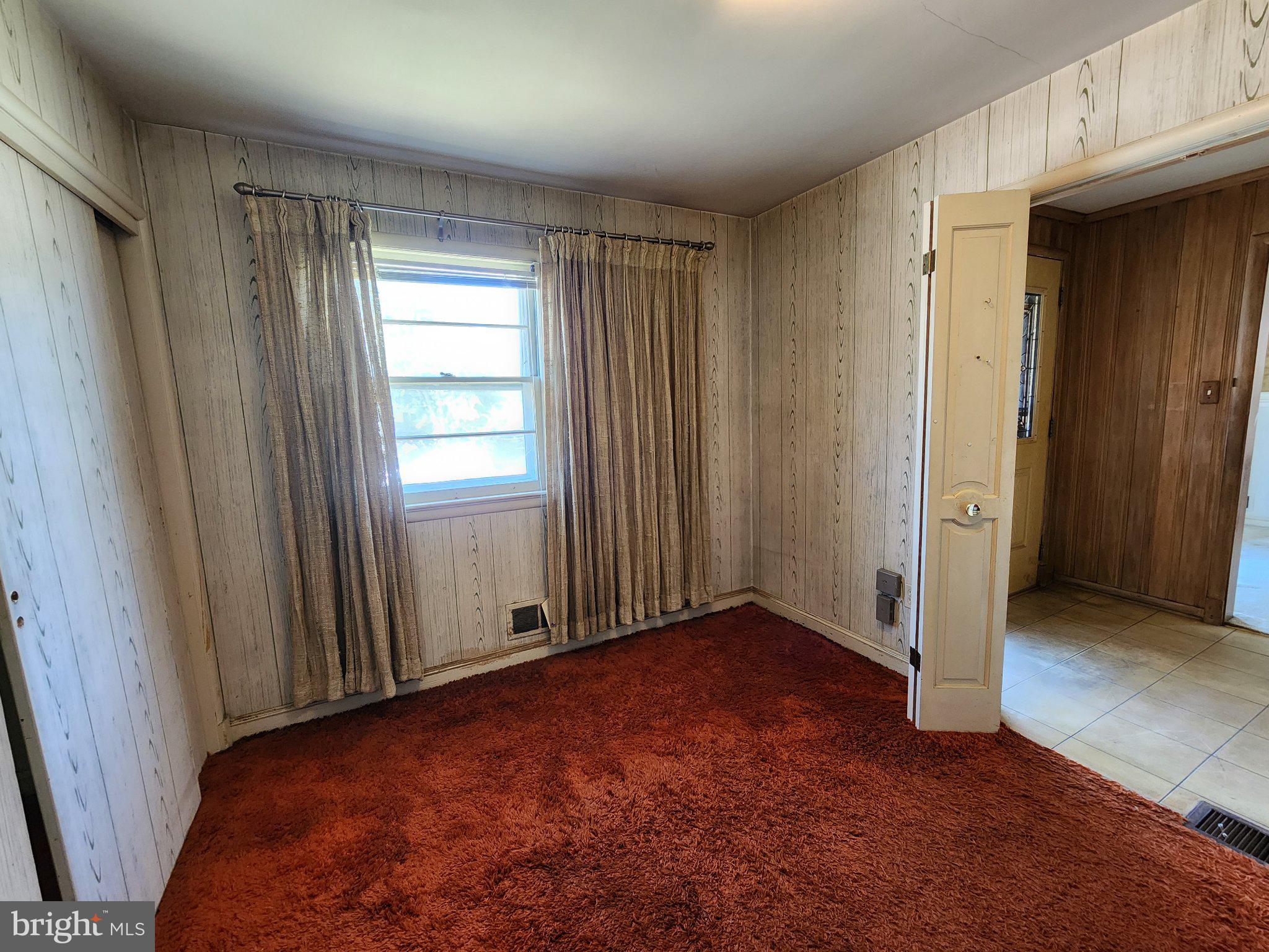 9709 Admiralty Drive Silver Spring, MD 20910 - Photo 21 of 39 Cozy room with warm, inviting tones.