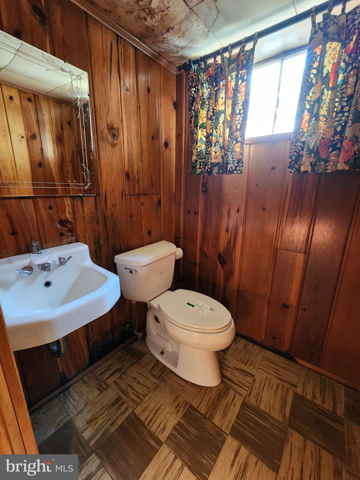 9709 Admiralty Drive Silver Spring, MD 20910 - Photo 33 of 39 Cozy bathroom with rustic charm.
