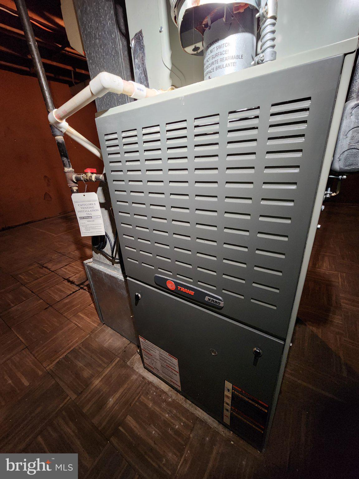 9709 Admiralty Drive Silver Spring, MD 20910 - Photo 35 of 39 Modern heating system in a cozy space.