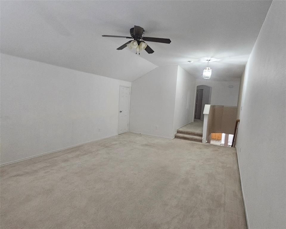 109 Greenfield Trail Forney, TX 75126 - Photo 14 of 26 a view of empty room with a ceiling fan and window
