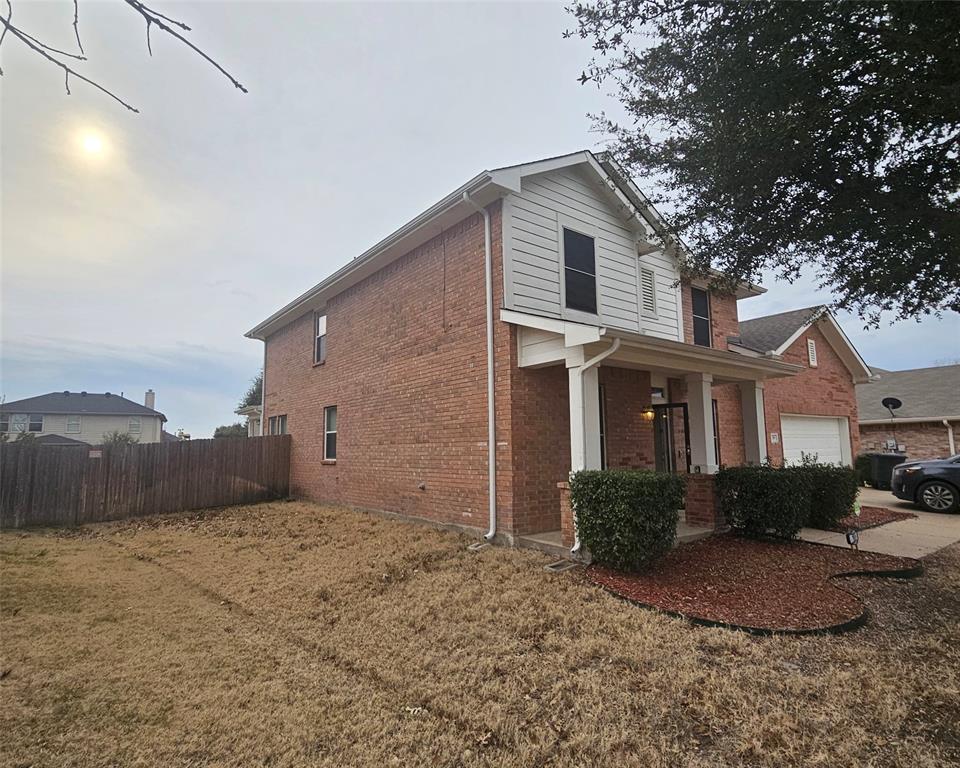 109 Greenfield Trail Forney, TX 75126 - Photo 23 of 26 a front view of a house with a yard