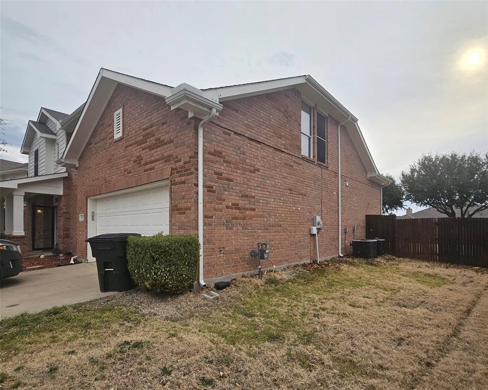 109 Greenfield Trail Forney, TX 75126 - Photo 24 of 26 a view of a house with a yard