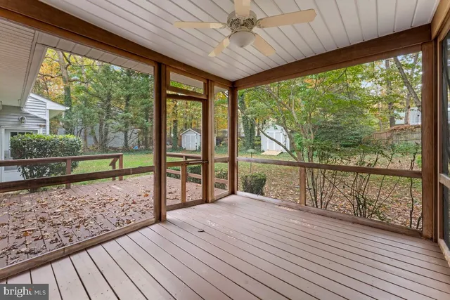 a view of a balcony with wooden floor