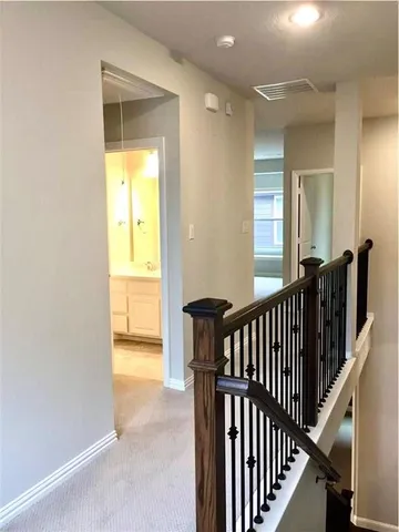 a view of hallway with livingroom
